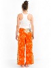 Pantalon fendu devant ample à motif original et coloré orange