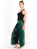 Pantalon fendu devant ample à motif plume de paon noir turquoise