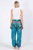 Pantalon bouffant turquoise à motif oriental milles et une nuits