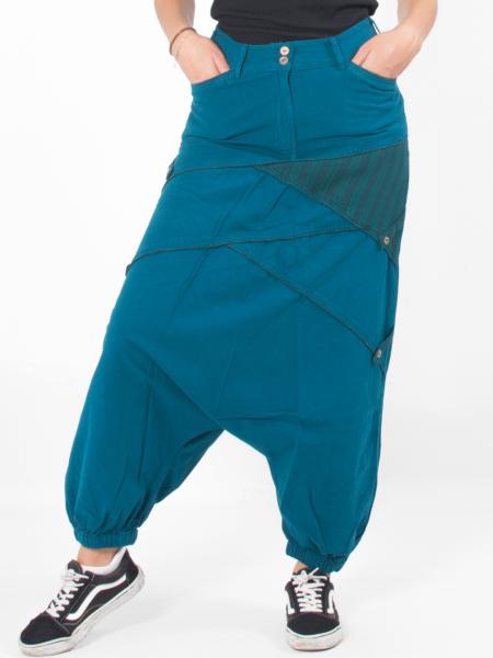 Pantalon sarouel slim bleu pétrole à découpes asymétriques
