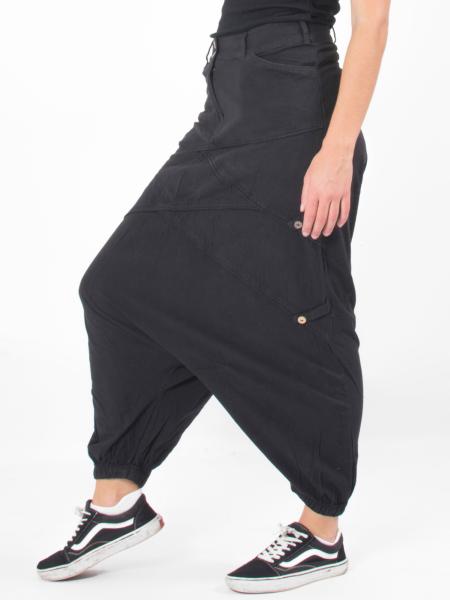 Pantalon sarouel slim noir à découpes asymétriques
