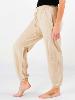 Pantalon bouffant beige uni à coupe ajustée